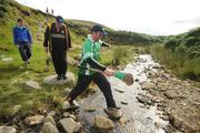 31 July 2010; Kilkenny's James McGarry crosses the stream during the 2010 M Donnelly Poc Fada na hÉireann. Annaverna Mountains, Dundalk, Co. Louth. Picture credit: Ray Lohan / SPORTSFILE