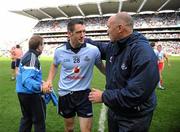31 July 2010; Denis Bastick is congratulated by Dublin selector David Hickey after the game. GAA Football All-Ireland Senior Championship Quarter-Final, Tyrone v Dublin, Croke Park, Dublin. Picture credit: Ray McManus / SPORTSFILE