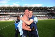 31 July 2010; Éamon Fennell, Dublin, with team-mate Paddy Andrews after the game. GAA Football All-Ireland Senior Championship Quarter-Final, Tyrone v Dublin, Croke Park, Dublin. Picture credit: Ray McManus / SPORTSFILE