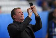 22 June 2016; Former Republic of Ireland International Ronnie Whelan takes a photograph of the stadium ahead of the UEFA Euro 2016 Group E match between Italy and Republic of Ireland at Stade Pierre-Mauroy in Lille, France. Photo by Stephen McCarthy / Sportsfile