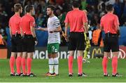 22 June 2016; Shane Long of Republic of Ireland speaks to match officials during the UEFA Euro 2016 Group E match between Italy and Republic of Ireland at Stade Pierre-Mauroy in Lille, France. Photo by David Maher / Sportsfile