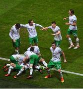 22 June 2016; Republic of Ireland players celebrate after Robbie Brady scored his side's first goal during the UEFA Euro 2016 Group E match between Italy and Republic of Ireland at Stade Pierre-Mauroy in Lille, France. Photo by Ray McManus / Sportsfile