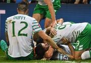 22 June 2016; Robbie Brady of Republic of Ireland, centre, celebrates with teammates after scoring his sides first goal during the UEFA Euro 2016 Group E match between Italy and Republic of Ireland at Stade Pierre-Mauroy in Lille, France. Photo by David Maher / Sportsfile