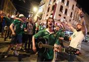 22 June 2016; Musician Richy Sheehy, from Carrignavar, Co. Cork, entertains Republic of Ireland supporters after their victory during the UEFA Euro 2016 Group E match between Italy and Republic of Ireland in Lille, France. Photo by Stephen McCarthy/Sportsfile