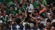 22 June 2016; Robbie Brady Republic of Ireland reaches up to his girlfriend Kerrie Harris at the end of the game at the UEFA Euro 2016 Group E match between Italy and Republic of Ireland at Stade Pierre-Mauroy in Lille, France. Photo by David Maher/Sportsfile