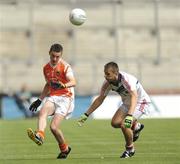 1 August 2010; James King, Armagh, in action against Jamie Wall, Cork. ESB GAA Football All-Ireland Minor Championship Quarter-Final, Cork v Armagh, Croke Park, Dublin. Picture credit: Oliver McVeigh / SPORTSFILE
