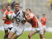 1 August 2010; Jamie Burns, Cork, in action against Dean Nugent, Armagh. ESB GAA Football All-Ireland Minor Championship Quarter-Final, Cork v Armagh, Croke Park, Dublin. Picture credit: Oliver McVeigh / SPORTSFILE