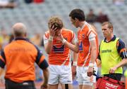 1 August 2010; A dejected Paul McGeown, Armagh, is comforted by Conor Gough after the game. ESB GAA Football All-Ireland Minor Championship Quarter-Final, Cork v Armagh, Croke Park, Dublin. Picture credit: Oliver McVeigh / SPORTSFILE
