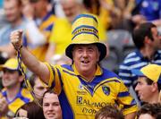 1 August 2010; A Roscommon supporter cheers on his team at the game. Supporters at the GAA Football All-Ireland Senior Championship Quarter-Finals, Croke Park, Dublin. Picture credit: Oliver McVeigh / SPORTSFILE