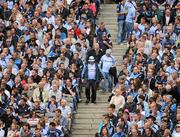 31 July 2010; Dublin supporters make their way back to their seats, in the Cusack Stand, after half time. Supporters at the GAA Football All-Ireland Senior Championship Quarter-Finals, Croke Park, Dublin. Picture credit: Ray McManus / SPORTSFILE