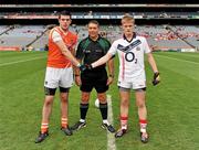 1 August 2010; Daniel Fitzgerald, Cork, right, shakes hands with Peter Carragher, Armagh, alongside referee Joe Curley. ESB GAA Football All-Ireland Minor Championship Quarter-Final, Cork v Armagh, Croke Park, Dublin. Picture credit: Oliver McVeigh / SPORTSFILE