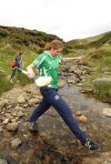 31 July 2010; Down's Fionnuala Carr makes her way across the stream during the 2010 M Donnelly Poc Fada na hÉireann. Annaverna Mountains, Dundalk, Co. Louth. Picture credit: Ray Lohan / SPORTSFILE