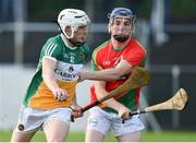 23 June 2016; Ronan Hughes of Offaly in action against John Murphy of Carlow during the Bord Gáis Energy Leinster GAA Hurling U21 Championship Semi-Final between Carlow and Offaly at Netwatch Cullen Park in Carlow. Photo by Matt Browne/Sportsfile