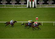 23 June 2016; Mr Right, with Donagh O'Connor up, cross the line to finish ahead of The Tulip, with Billy Lee up, who finished second, and Canary Row, with Gary Halpin up, on their way to winning the Dublin Horse Show 20-24 Handicap during the Bulmer's Evening Meeting at Leopardstown Racecourse in Leopardstown, Dublin. Photo by Cody Glenn/Sportsfile