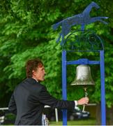 23 June 2016; Clerk of the Course Lorcan Weyr rings the parade ring bell during the Bulmer's Evening Meeting at Leopardstown Racecourse in Leopardstown, Dublin. Photo by Cody Glenn/Sportsfile