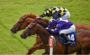 24 June 2016; Rattling Jewel, 14, with Wayne Lordan up, cross the line by a nose in a photo finish ahead of In Salutem, with Pat Smullen up, to win the RTE Radio One Handicap at the Curragh Racecourse in the Curragh, Co. Kildare. Photo by Cody Glenn/Sportsfile