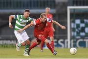 24 June 2016; Stephen Dooley of Cork City is tackled by Patrick Cregg of Shamrock Rovers during the SSE Airtricity League Premier Division game between Shamrock Rovers and Cork City at Tallaght Stadium in Tallaght, Dublin. Photo by Ramsey Cardy/Sportsfile