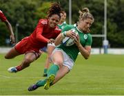 25 June 2016; Alison Miller of Ireland is tackled by Nicolette Pantor of Trinidad & Tobago as she scores her side's first try of the match during the World Rugby Women's Sevens Olympic Repechage Pool C match between Ireland and Trinidad & Tobago at UCD Sports Centre in Belfield, Dublin. Photo by Seb Daly/Sportsfile