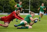 25 June 2016; Alison Miller of Ireland is tackled by Nicolette Pantor of Trinidad & Tobago as she scores her side's first try of the match during the World Rugby Women's Sevens Olympic Repechage Pool C match between Ireland and Trinidad & Tobago at UCD Sports Centre in Belfield, Dublin. Photo by Seb Daly/Sportsfile