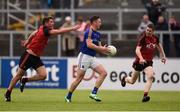 25 June 2016; Michael Quinn of Longford in action against Peter Turley and Joe Murphy, right, of Down during the GAA Football All-Ireland Senior Championship Round 1B game between Down and Longford at Pairc Esler in Newry, Co Down. Photo by Sportsfile