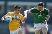 25 June 2016; Patrick McBride of Antrim in action against Brian Fanning of Limerick during the All-Ireland Football Senior Championship 1B qualifier game between Antrim and Limerick at Corrigan Park in Belfast. Photo by Ramsey Cardy/Sportsfile