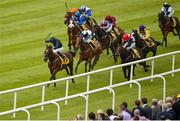 25 June 2016; Eventual winner Intelligence Cross, with Ryan Moore up, races ahead of the field on their way to winning the Dubai Duty Free Finest Surprise European Breeders Fund Maiden at the Curragh Racecourse in the Curragh, Co. Kildare. Photo by Cody Glenn/Sportsfile