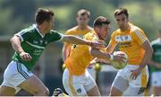 25 June 2016; Conor Murray of Antrim in action against Pa Rannahan of Limerick during the All-Ireland Football Senior Championship 1B qualifier game between Antrim and Limerick at Corrigan Park in Belfast. Photo by Ramsey Cardy/Sportsfile