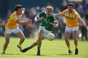 25 June 2016; Sean O'Dea of Limerick in action against Dermott McAleese of Antrim during the All-Ireland Football Senior Championship 1B qualifier game between Antrim and Limerick at Corrigan Park in Belfast. Photo by Ramsey Cardy/Sportsfile