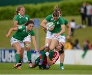 25 June 2016; Alison Miller of Ireland is tackled Catrina Ribeiro of Portugal during the World Rugby Women's Sevens Olympic Repechage Pool C match between Ireland and Portugal at UCD Sports Centre in Belfield, Dublin. Photo by Seb Daly/Sportsfile