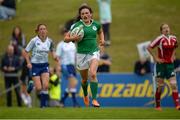 25 June 2016; Captain of Ireland Lucy Mulhall scores her side's fourth try of the match during the World Rugby Women's Sevens Olympic Repechage Pool C match between Ireland and Portugal at UCD Sports Centre in Belfield, Dublin. Photo by Seb Daly/Sportsfile