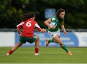 25 June 2016; Lucy Mulhall of Ireland in action against Isabel Ozorio of Portugal during the World Rugby Women's Sevens Olympic Repechage Pool C match between Ireland and Portugal at UCD Sports Centre in Belfield, Dublin. Photo by Seb Daly/Sportsfile