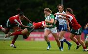 25 June 2016; Stacey Flood of Ireland is tackled Arlete Goncalves, left, Catrina Ribeiro, centre, and Christina Ramos, right, of Portugal during the World Rugby Women's Sevens Olympic Repechage Pool C match between Ireland and Portugal at UCD Sports Centre in Belfield, Dublin. Photo by Seb Daly/Sportsfile