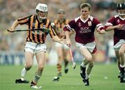 5 September 1993; A Kilkenny player loses his boots against Galway. All-Ireland Minor Hurling Championship FinalKilkenny v Galway, Croke Park, Dublin. Picture credit: Ray McManus / SPORTSFILE