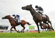 25 June 2016; Eventual winner Medicine Jack, left, with Colin Keane up, races ahead of Peace Envoy, with Ryan Moore up, on their way to winning the Gain Railway Stakes at the Curragh Racecourse in the Curragh, Co. Kildare. Photo by Cody Glenn/Sportsfile