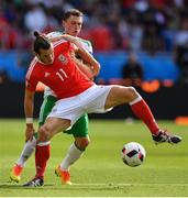 25 June 2016; Gareth Bale of Wales in action against Corry Evans of Northern Ireland during the UEFA Euro 2016 Round of 16 match between Wales and Northern Ireland at Parc de Princes in Paris, France. Photo by Stephen McCarthy/Sportsfile