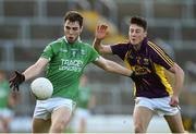 25 June 2016; Ryan Jones of Fermanagh in action against Eoghan Nolan of Wexford during their GAA Football All-Ireland Senior Championship Round 1B match at Innovate Wexford Park in Wexford. Photo by Diarmuid Greene/Sportsfile