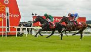 25 June 2016; Eventual winner Harzand, with Pat Smullen up, ahead of Idaho, with Ryan Moore up, crosses the line to win the Dubai Duty Free Irish Derby at the Curragh Racecourse in the Curragh, Co. Kildare. Photo by Cody Glenn/Sportsfile