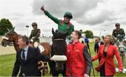 25 June 2016; Pat Smullen celebrates after winning the Dubai Duty Free Irish Derby on Harzand at the Curragh Racecourse in the Curragh, Co. Kildare. Photo by Cody Glenn/Sportsfile