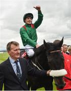 25 June 2016; Pat Smullen celebrates after winning the Dubai Duty Free Irish Derby on Harzand at the Curragh Racecourse in the Curragh, Co. Kildare. Photo by Cody Glenn/Sportsfile