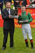 25 June 2016; Trainer Dermot Weld with Jockey Pat Smullen after winning the Dubai Duty Free Irish Derby with Harzand at the Curragh Racecourse in the Curragh, Co. Kildare. Photo by Cody Glenn/Sportsfile