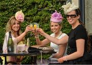 25 June 2016; Racegoers, from left, Sandra Barter, from Clonmel, Co Tipperary, Bernadette Ralleigh, from Thurles, Co Tipperary, and Alice Fitzgerald, from Rathcormac, Co Cork, at the Curragh Racecourse in the Curragh, Co. Kildare. Photo by Cody Glenn/Sportsfile