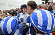25 June 2016; Jockey Colin Keane talks to owner Sean Jones after winning the Gain Railway Stakes on Medicine Jack at the Curragh Racecourse in the Curragh, Co. Kildare. Photo by Cody Glenn/Sportsfile