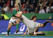 25 June 2016; Stuart Olding of Ireland is tackled by Pieter-Steph du Toit of South Africa during the Castle Lager Incoming Series 3rd Test between South Africa and Ireland at the Nelson Mandela Bay Stadium in Port Elizabeth, South Africa. Photo by Brendan Moran/Sportsfile