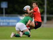 25 June 2016; Yang Min of China is tackled by Ashleigh Baxter of Ireland during the World Rugby Women's Sevens Olympic Repechage Pool C match between Ireland and China at UCD Sports Centre in Belfield, Dublin. Photo by Seb Daly/Sportsfile