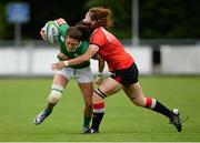 25 June 2016; Amee Leigh Murphy Crowe of Ireland is tackled by Zhang Wanting of China during the World Rugby Women's Sevens Olympic Repechage Pool C match between Ireland and China at UCD Sports Centre in Belfield, Dublin. Photo by Seb Daly/Sportsfile