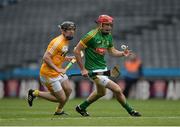 25 June 2016; Seán Geraghty of Meath in action against Ciarán Clarke of Antrim during the Christy Ring Cup Final Replay between Antrim and Meath at Croke Park in Dublin. Photo by Piaras Ó Mídheach/Sportsfile