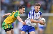 25 June 2016; Conor McCarthy of Monaghan is tackled by Eoin McHugh of Donegal during the Ulster GAA Football Senior Championship Semi-Final game between Donegal and Monaghan at Kingspan Breffni Park in Cavan. Photo by Ramsey Cardy/Sportsfile