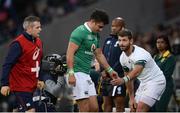 25 June 2016; Tiernan O'Halloran of Ireland leaves the pitch after a tackle by Willie le Roux, right, of South Africa during the Castle Lager Incoming Series 3rd Test between South Africa and Ireland at the Nelson Mandela Bay Stadium in Port Elizabeth, South Africa. Photo by Brendan Moran/Sportsfile