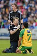 25 June 2016; Donegal Doctor Kevin Moran treating Frank McGlynn for concussion during the Ulster GAA Football Senior Championship Semi-Final game between Donegal and Monaghan at Kingspan Breffni Park in Cavan. Photo by Oliver McVeigh/Sportsfile