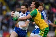 25 June 2016; Owen Duffy of Monaghan in action against Eamonn McGee of Donegal during the Ulster GAA Football Senior Championship Semi-Final game between Donegal and Monaghan at Kingspan Breffni Park in Cavan. Photo by Oliver McVeigh/Sportsfile